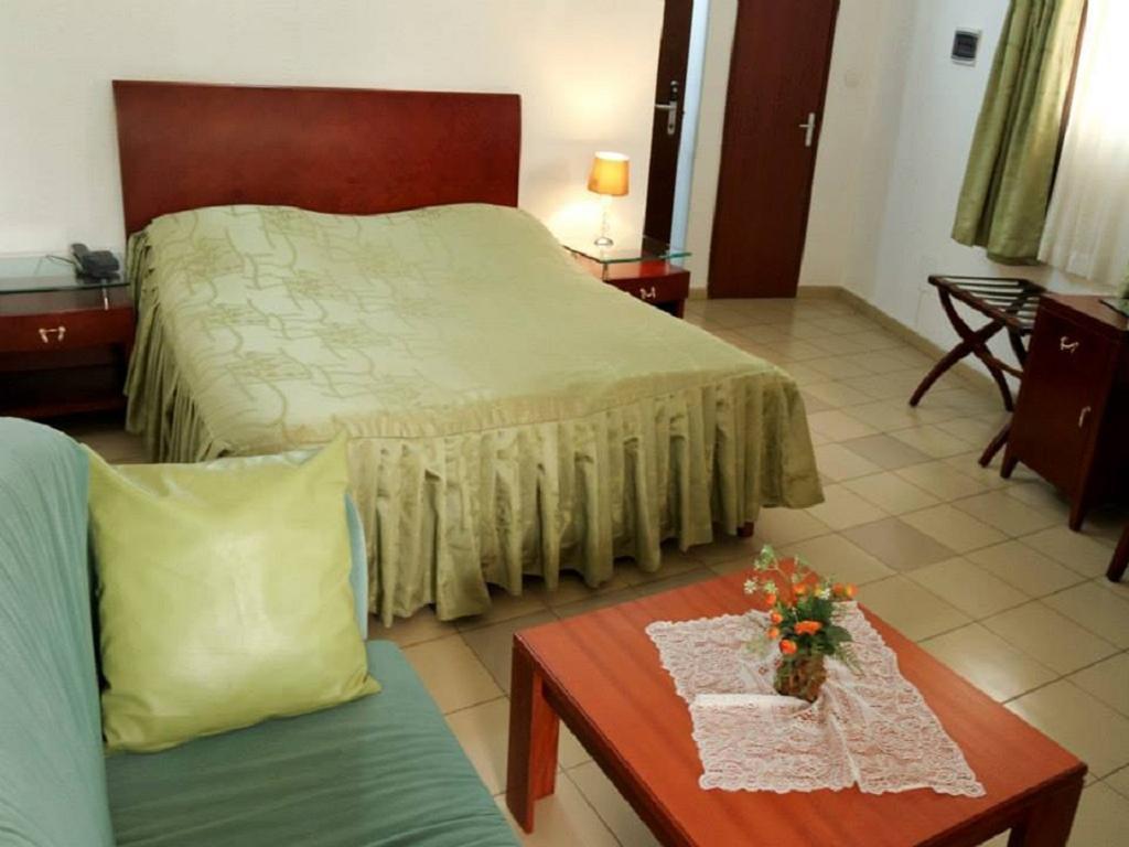 Paradise Hotel Ломе Номер фото